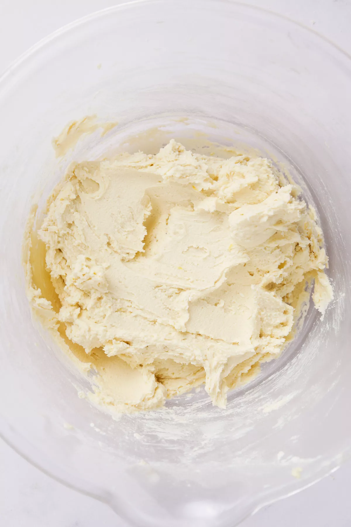 cookie dough for lemon curd cookies in a mixing bowl