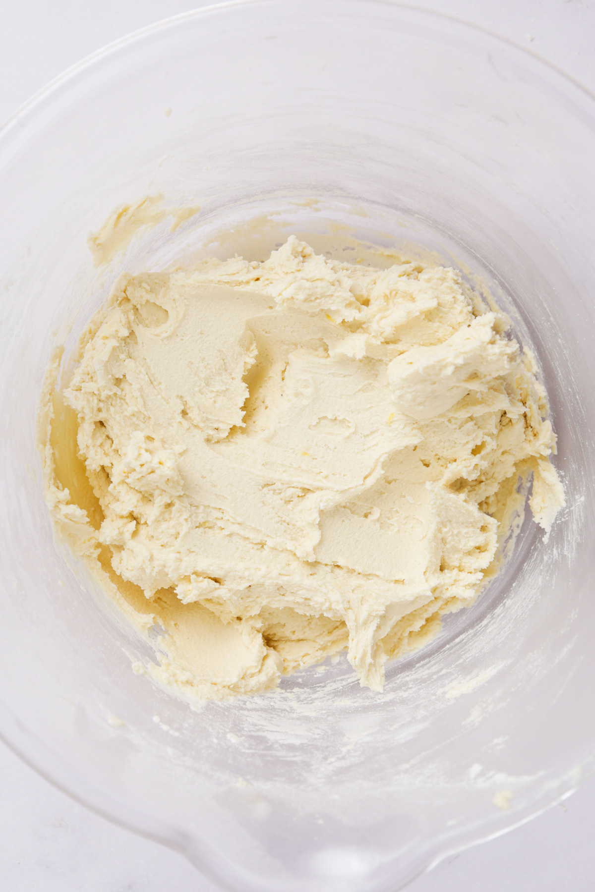 cookie dough for lemon curd cookies in a mixing bowl