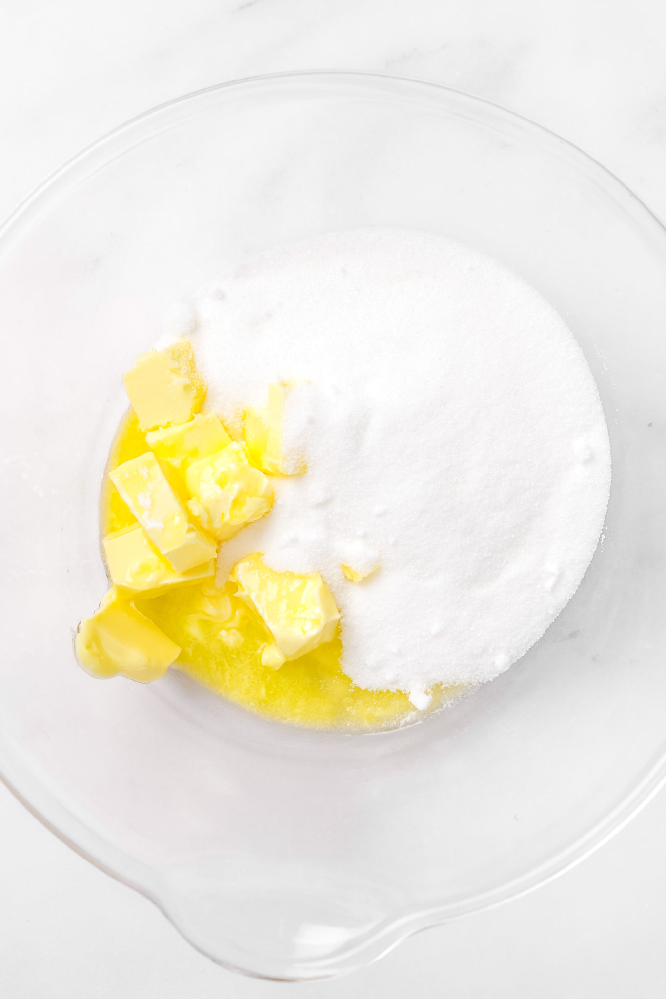 Mixing bowl with butter and sugar for rainbow cake batter