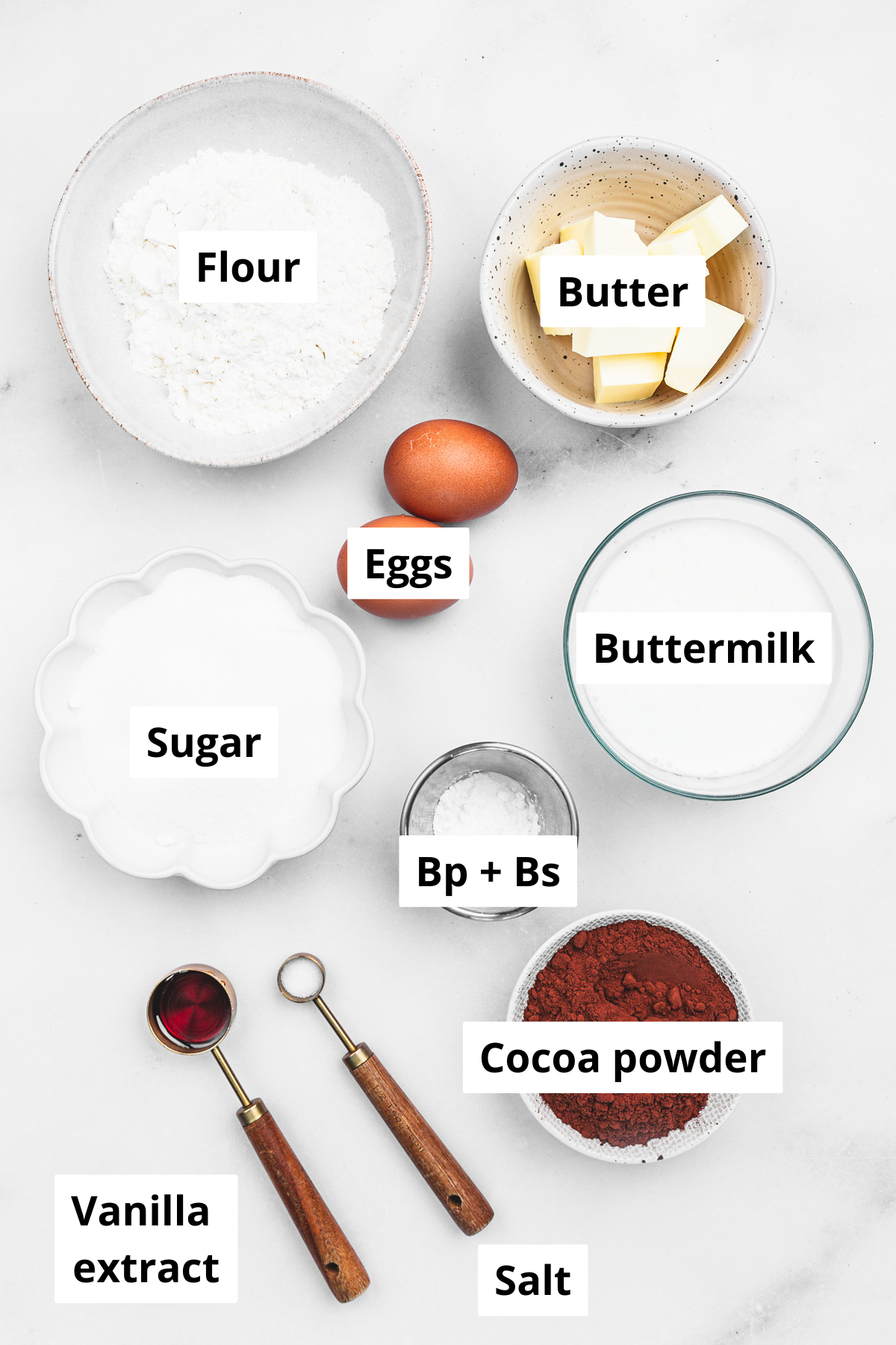 Bowls with ingredients to make Dubai chocolate cupcakes