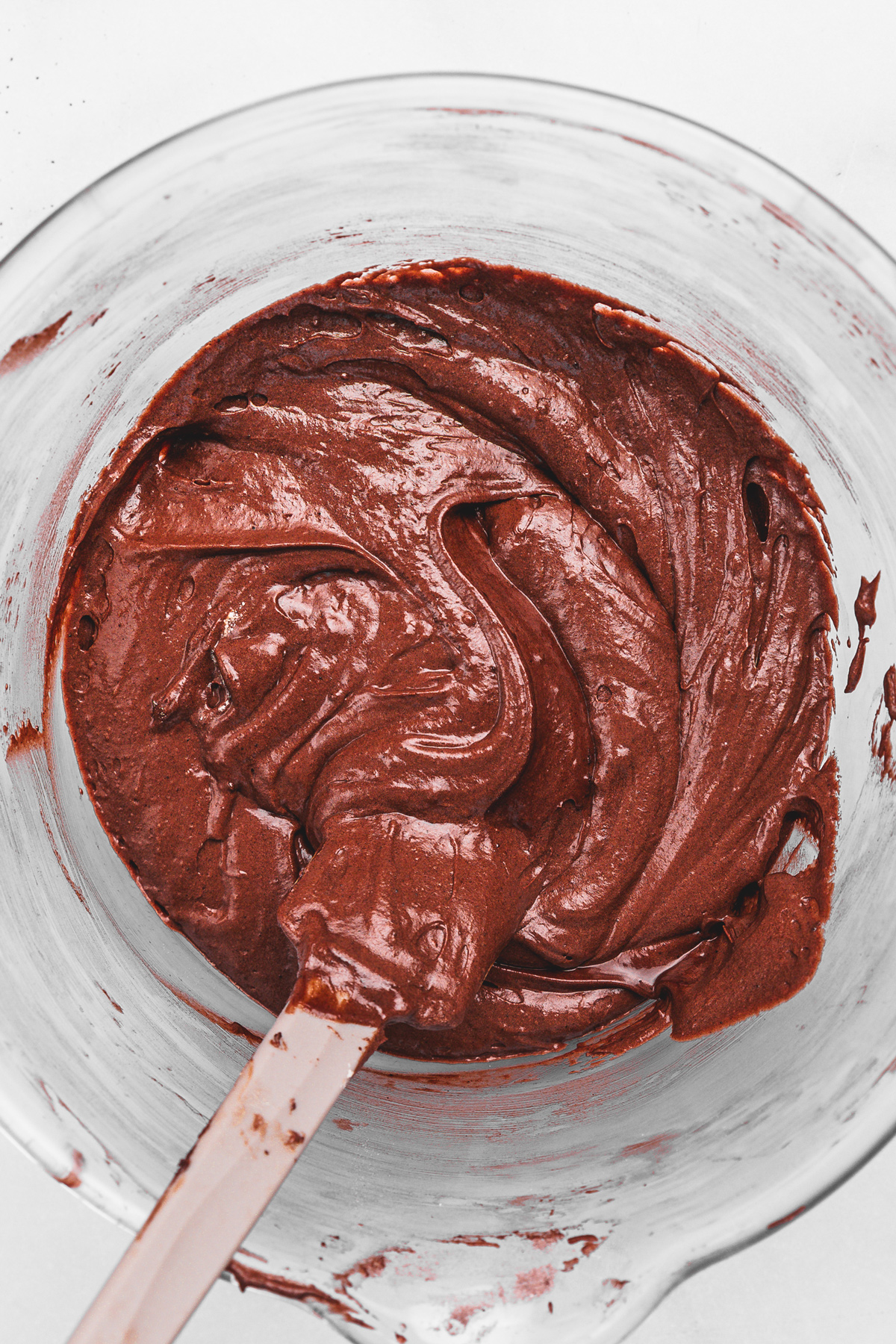 Bowl with smooth chocolate cupcake batter