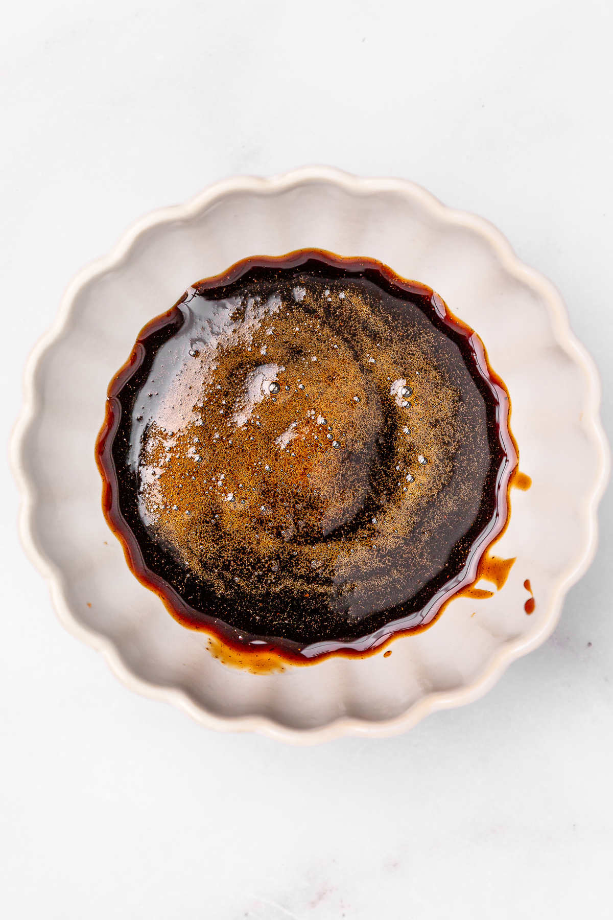 Bowl with cinnamon sugar syrup mixture