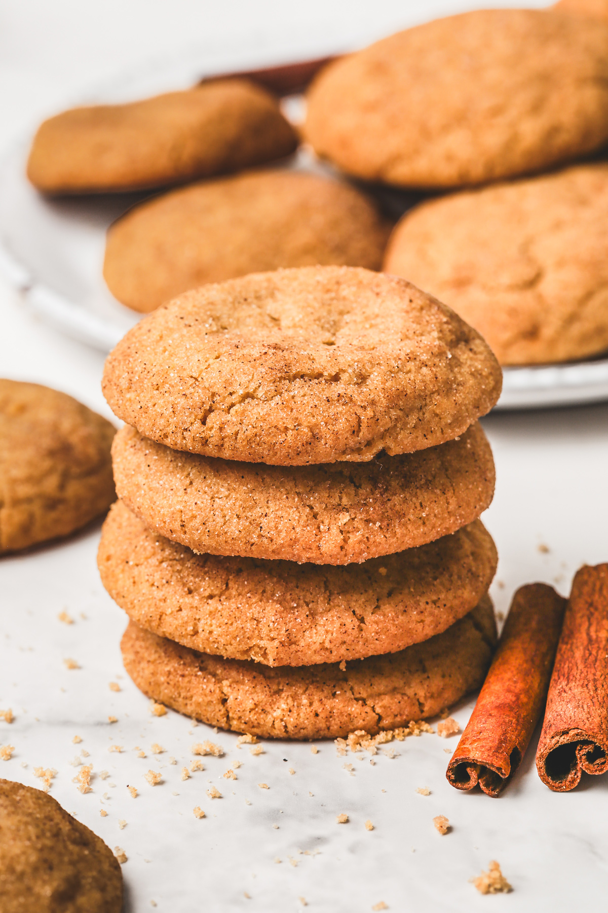 Stack of chewy cinnamon sugar cookies on a table