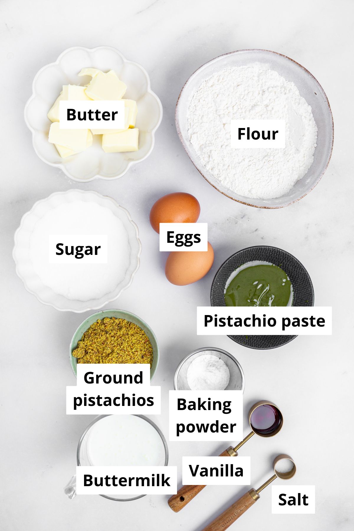 Bowls with ingredients to make pistachio cupcakes recipe