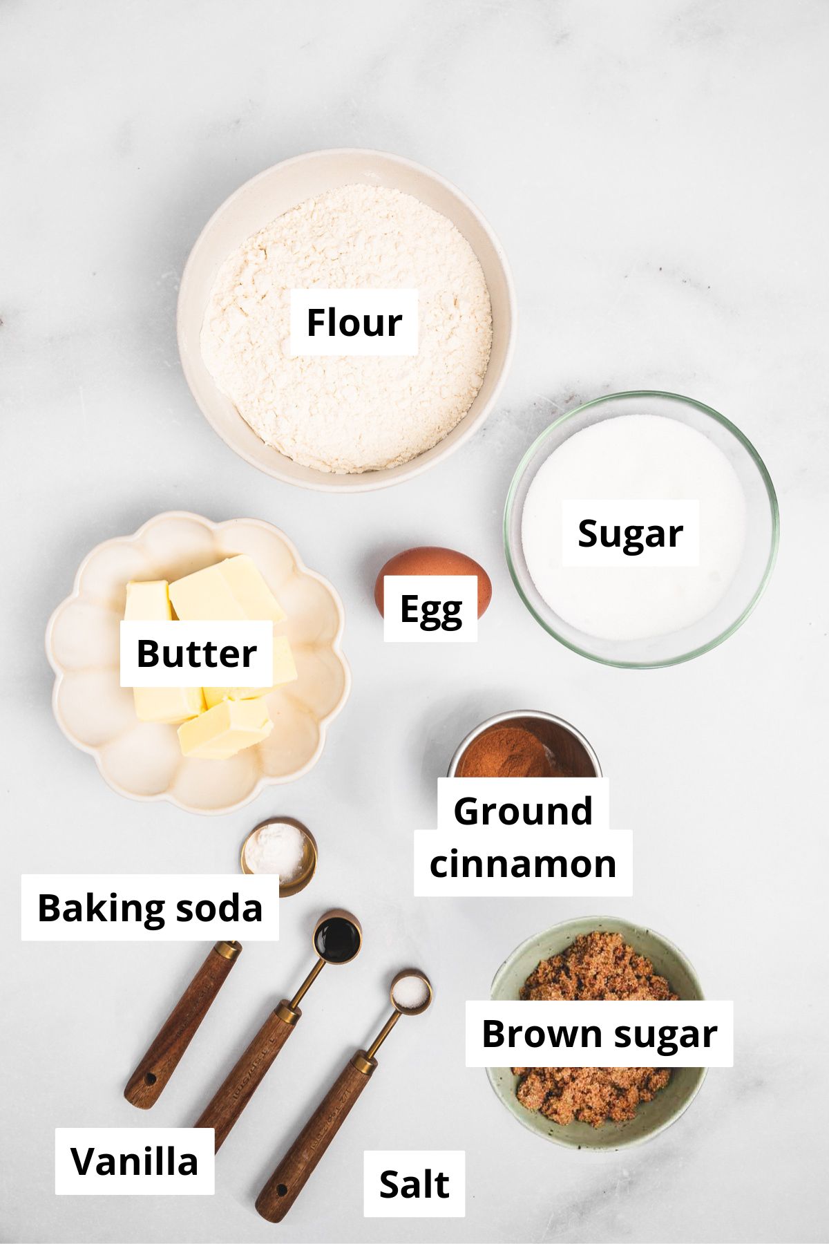 Bowls with ingredients for cinnamon sugar cookies