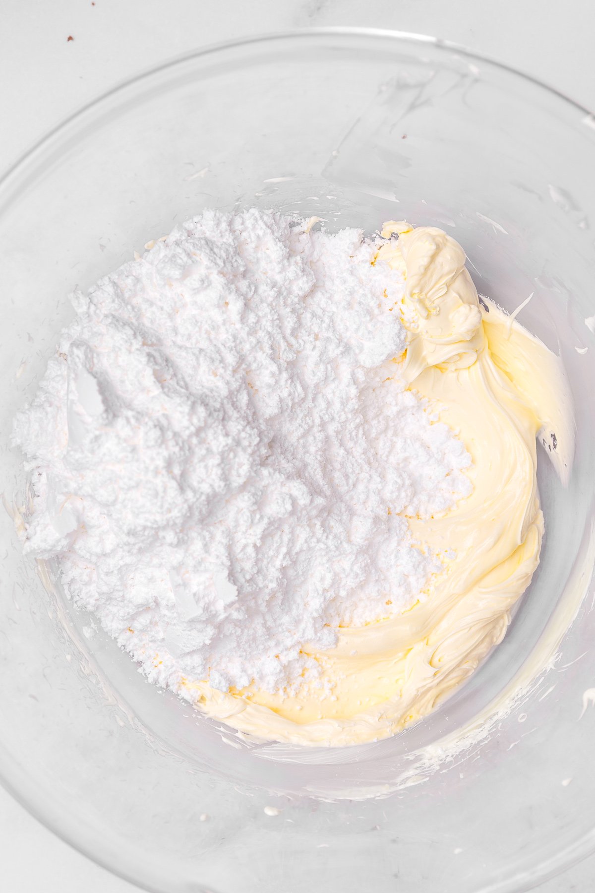Butter and powdered sugar beaten together in a mixing bowl