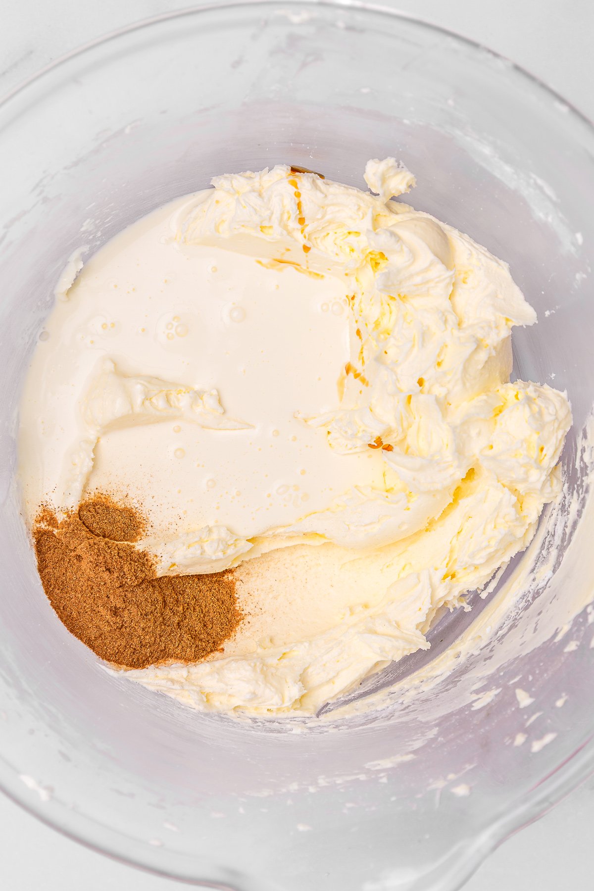 Butter, sugar, cream, and ground cinnamon whipped into frosting