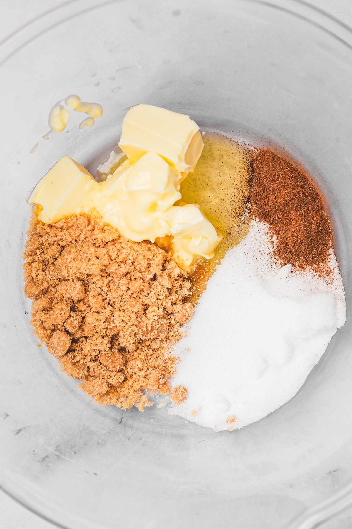 Butter sugar and cinnamon in a mixing bowl