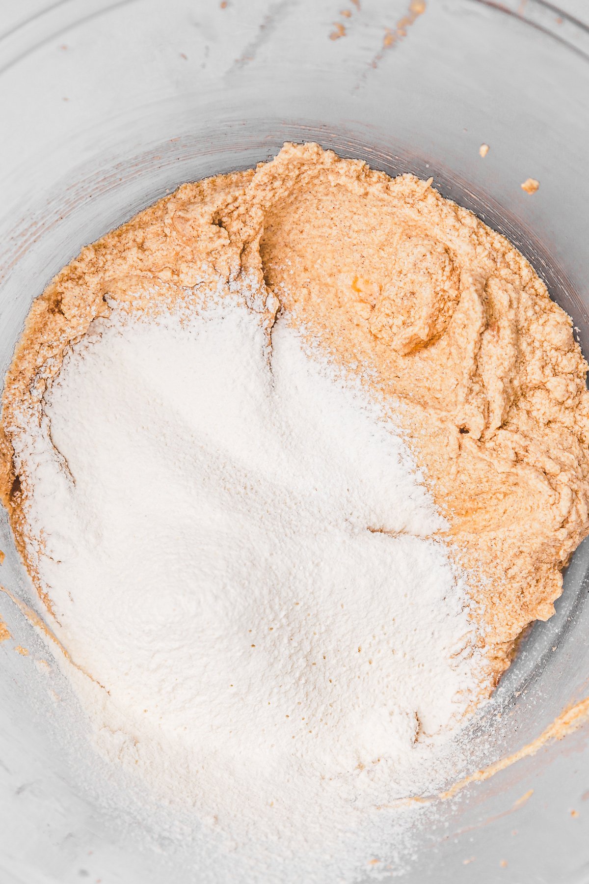 Cupcake batter with flour and cinnamon in a bowl