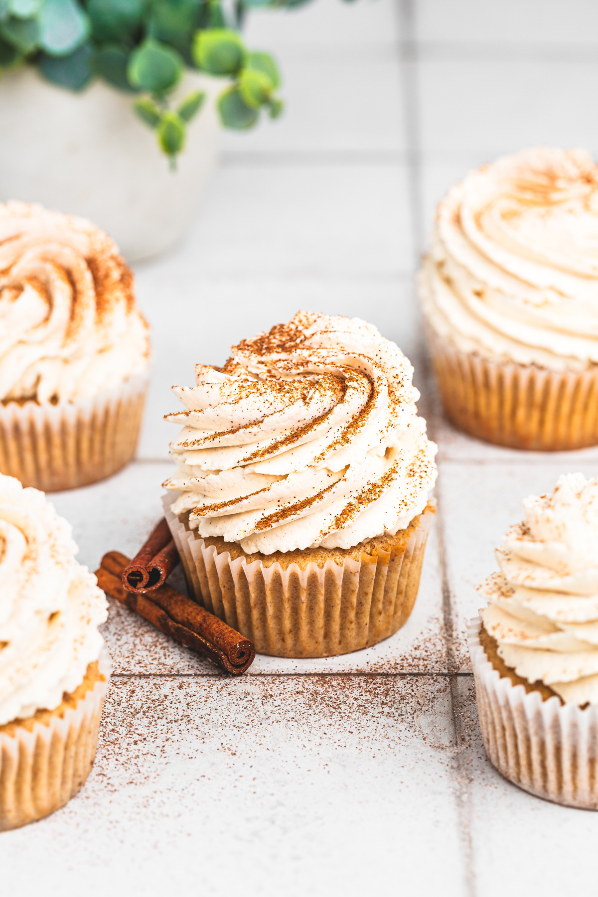 Bowls with ingredients for cinnamon cupcakes recipe