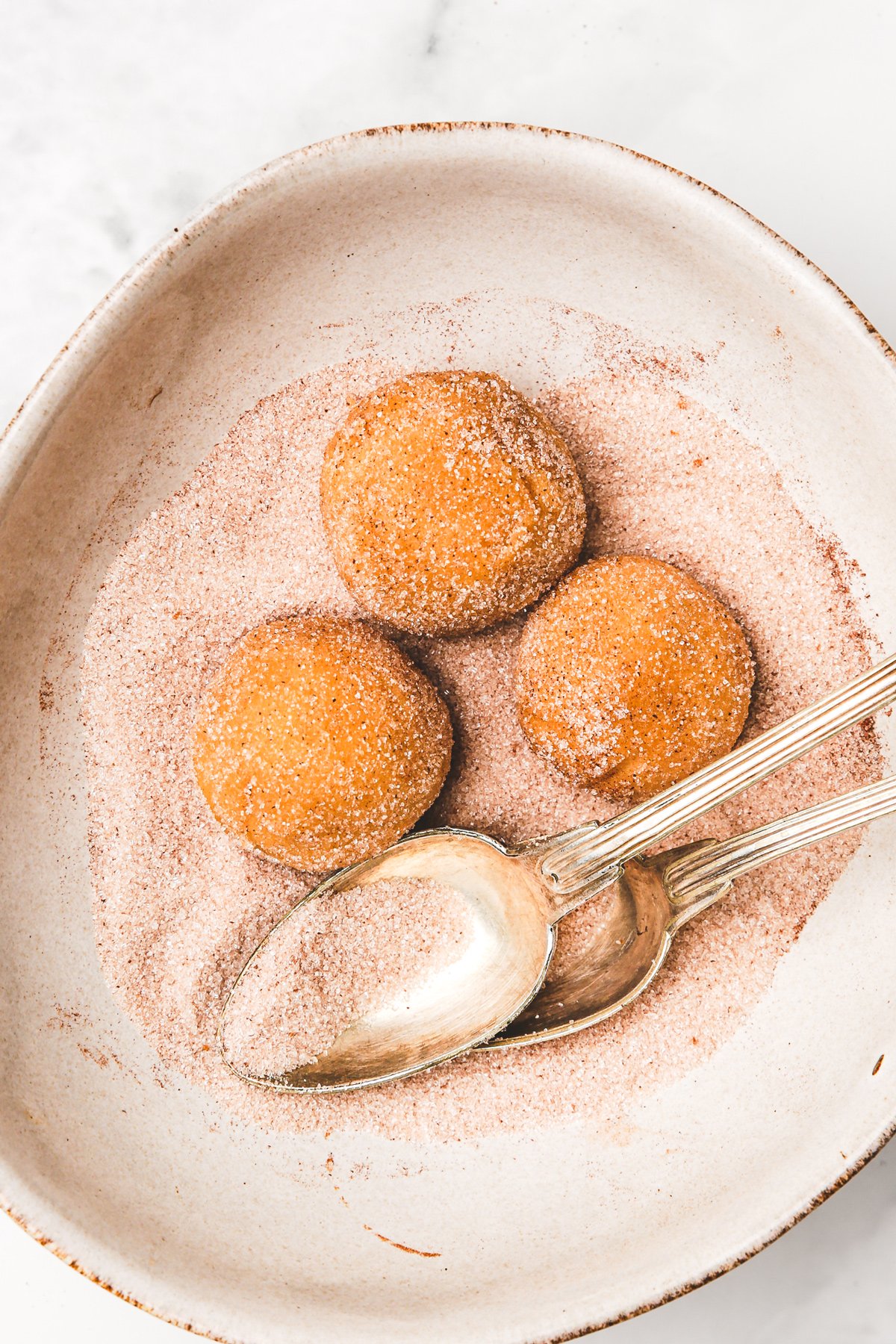 Bowl with cinnamon sugar mixture for coating
