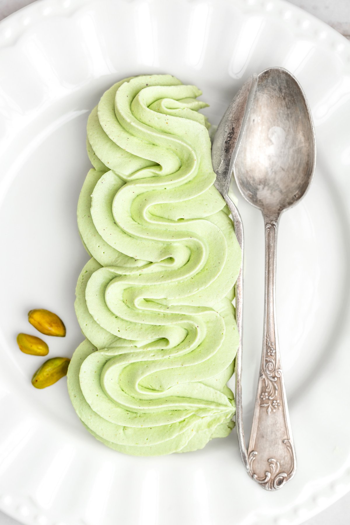 Close up of creamy pistachio frosting swirl
