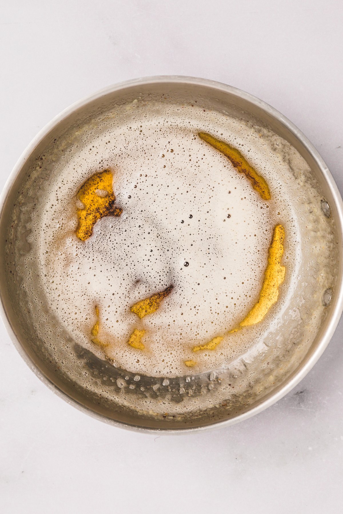 Brown butter in a saucepan for snickerdoodles