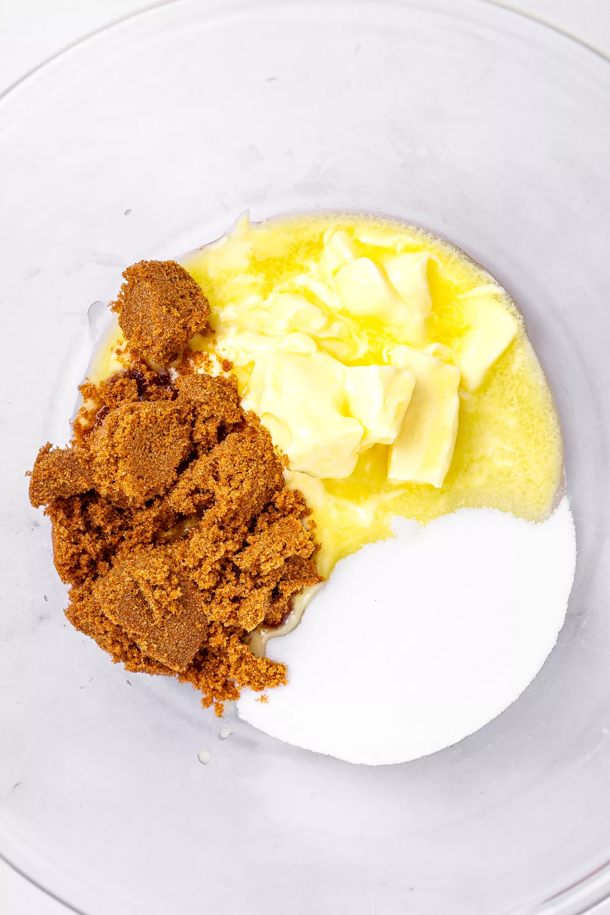 Mixing butter and sugar for white chocolate pistachio cookies dough