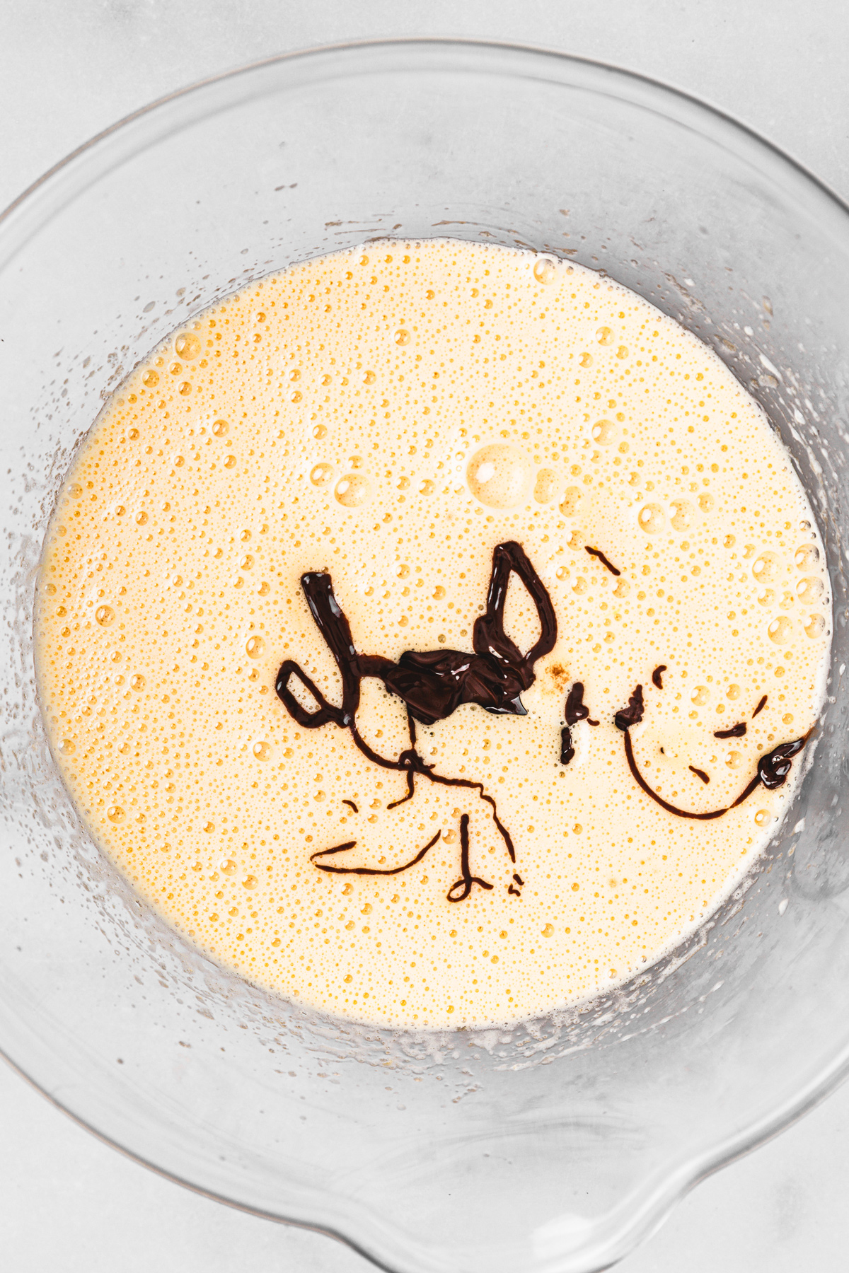 Whipped egg and sugar mixture combined with melted chocolate and Nutella