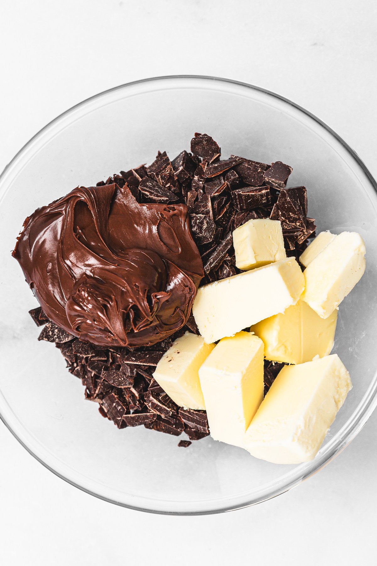 Mixing bowl with melted chocolate, butter, and Nutella spread