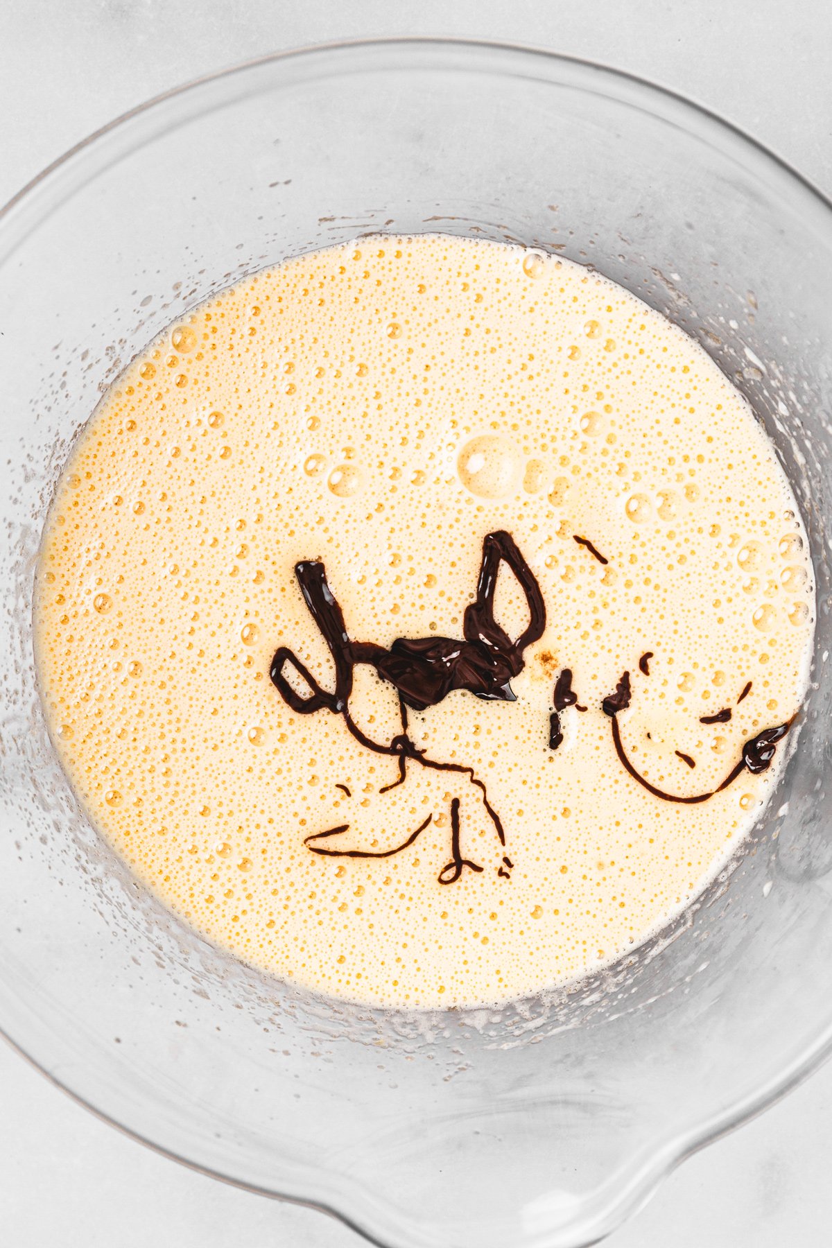 Whipped egg and sugar mixture combined with melted chocolate and Nutella