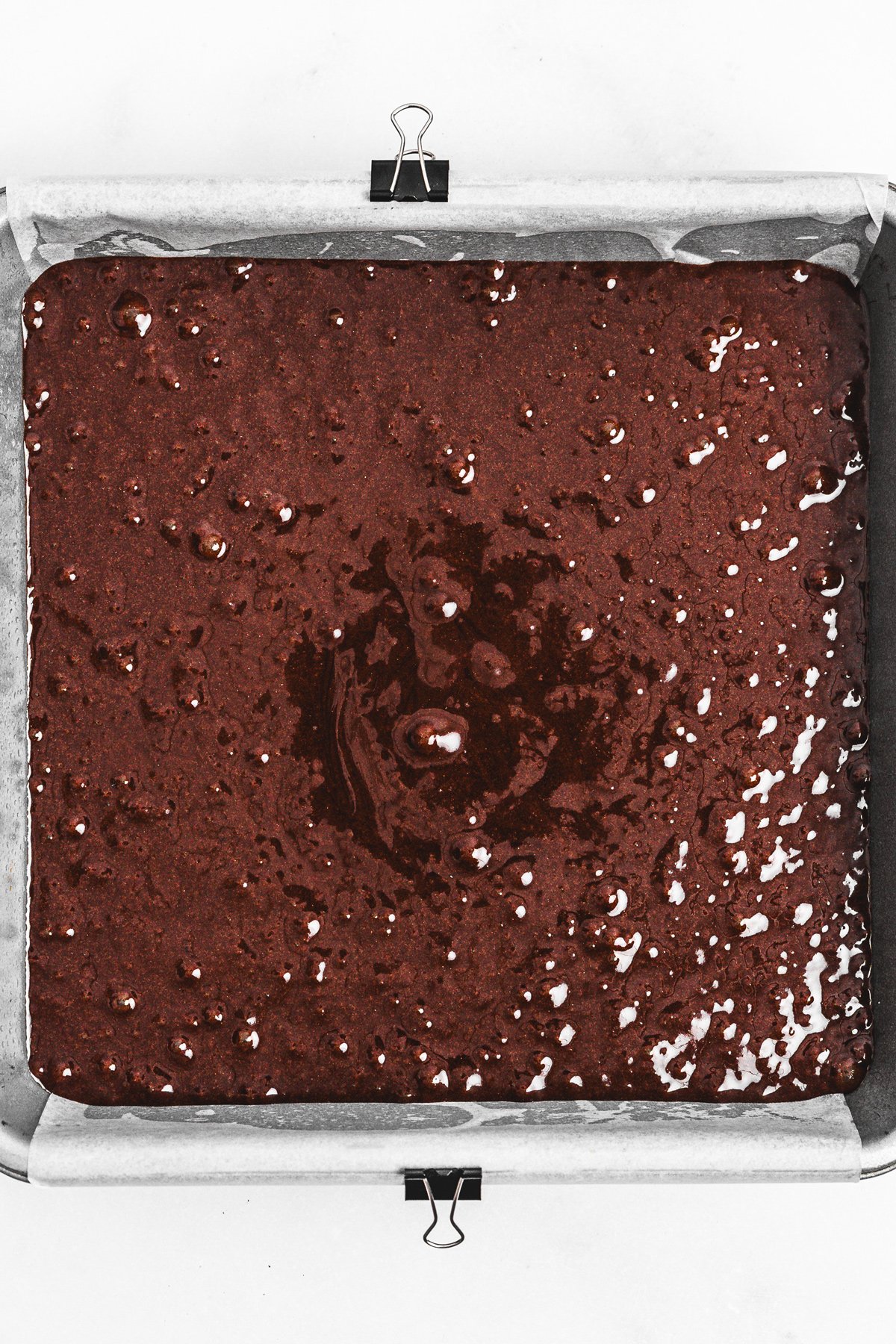 Brownie pan filled with Nutella brownie batter