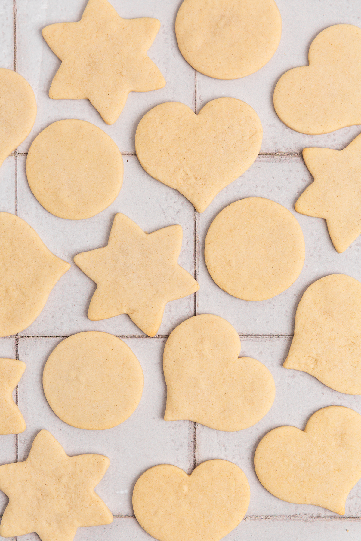 decorated no chill sugar cookies cooling on a work surface