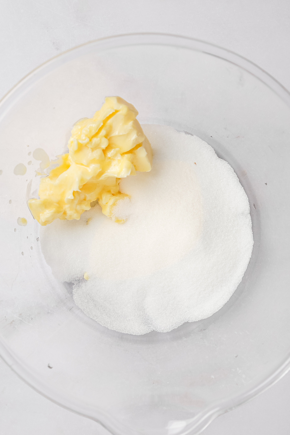 butter and sugar mixed for soft sugar cookies