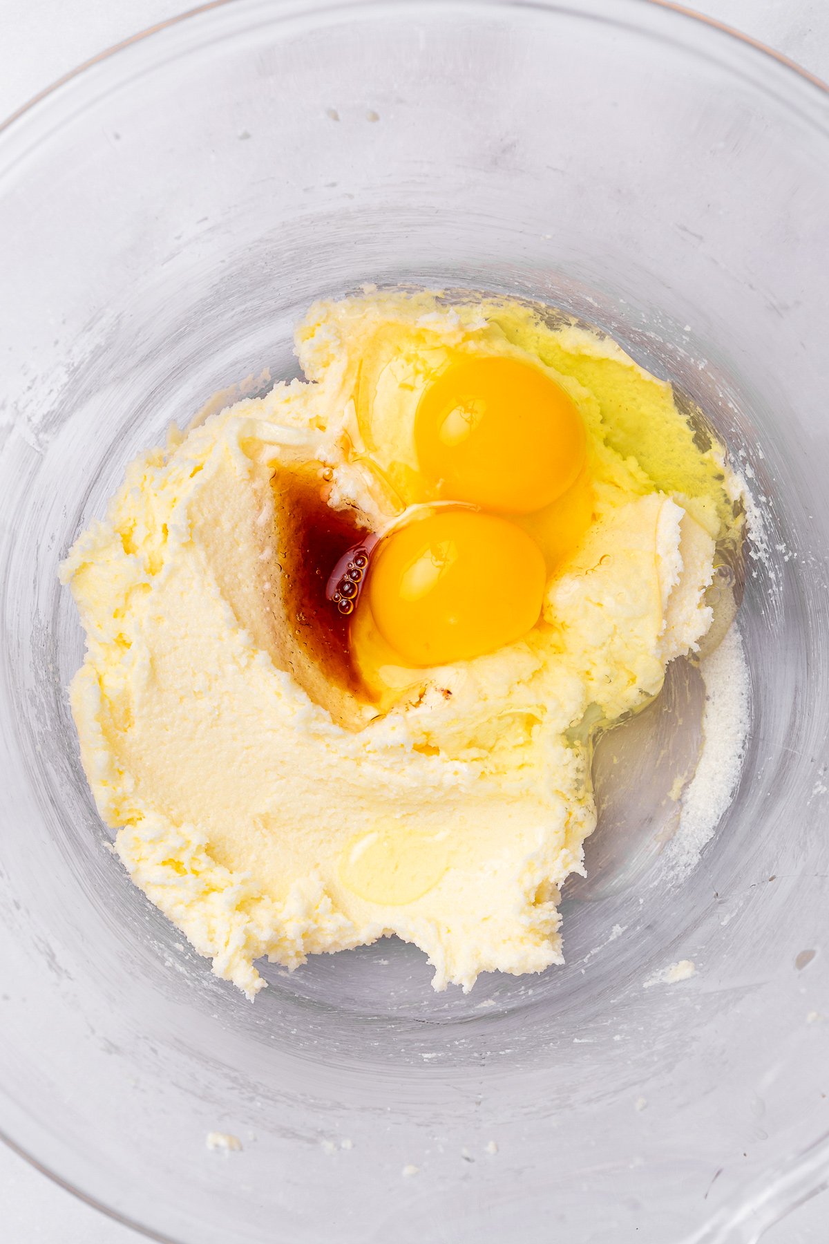 mixing butter sugar eggs and vanilla for chocolate cupcakes