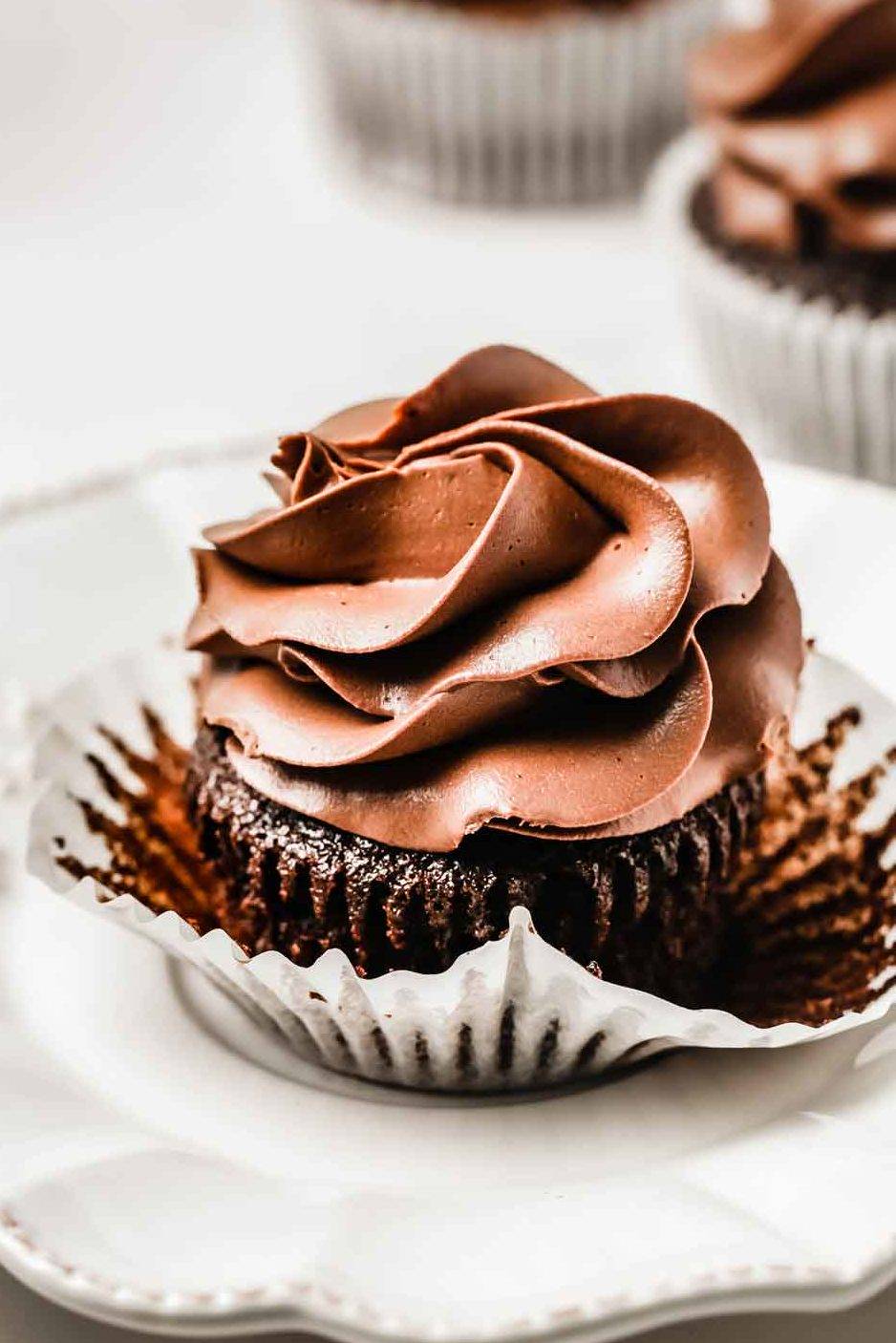 chocolate cupcakes with oil on a table
