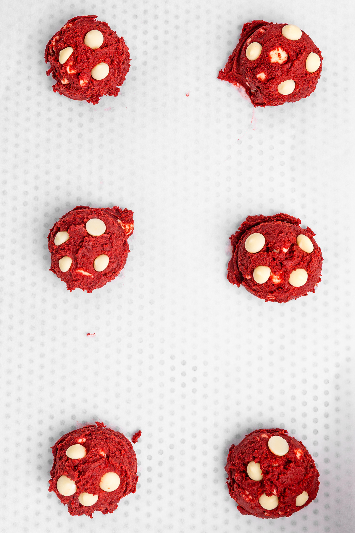 red velvet cookie dough ball before baking