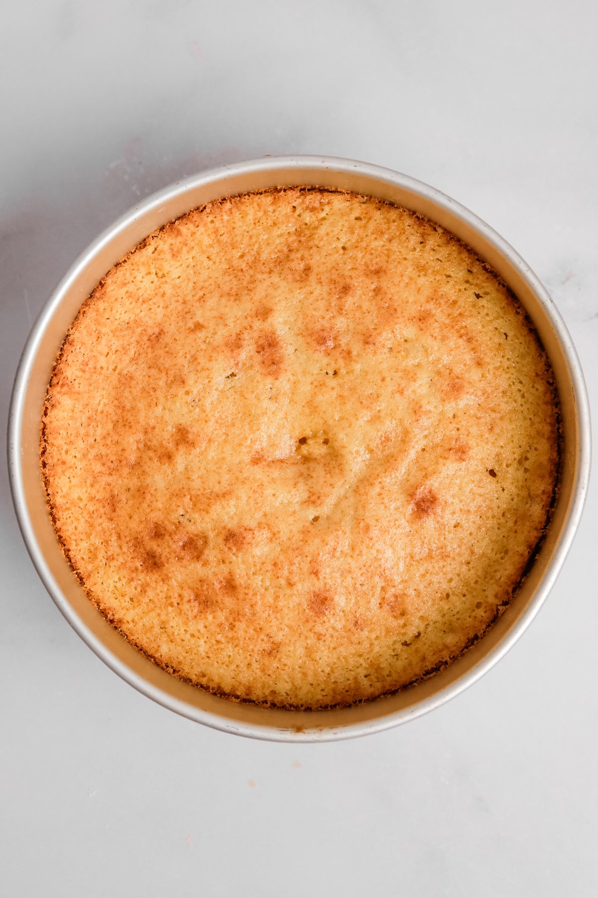 vanilla cake layers baked in a cake pan