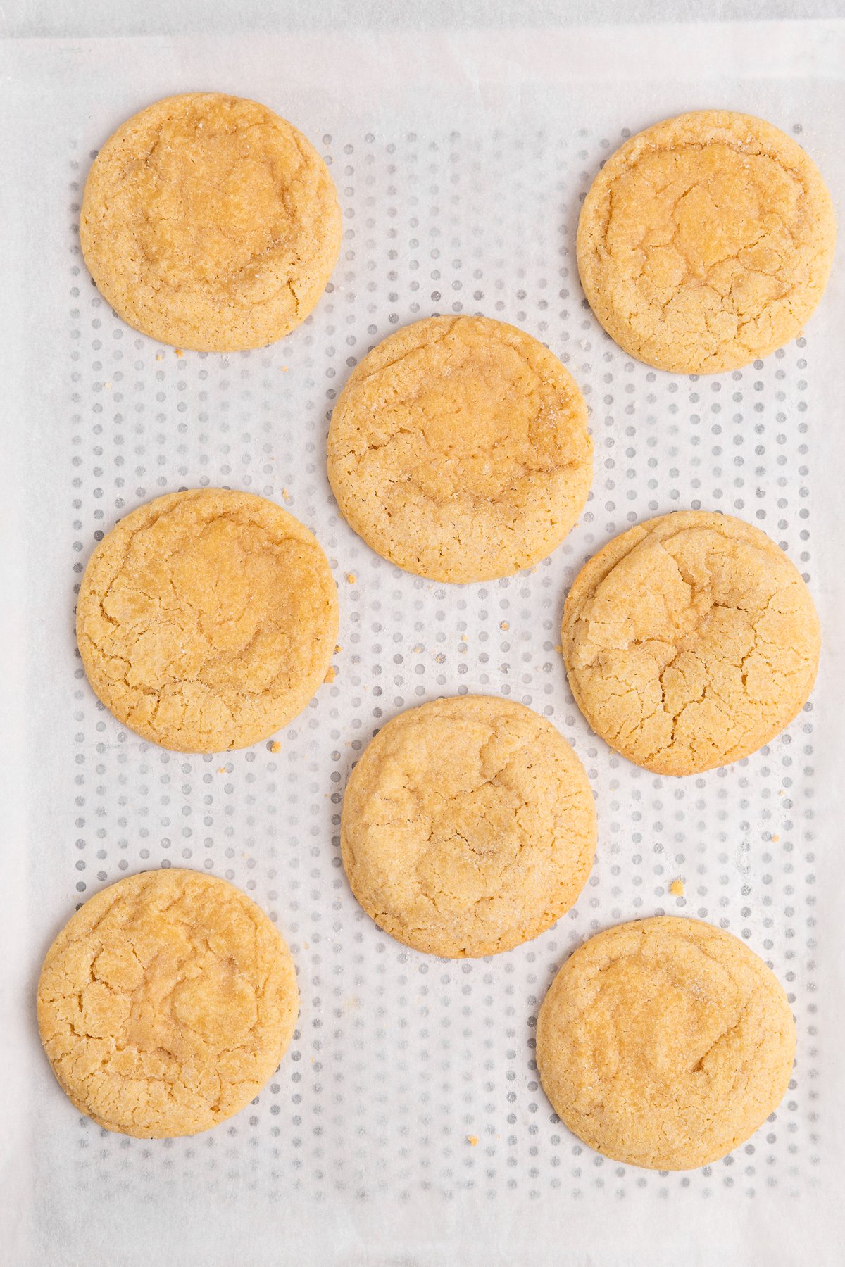soft sugar cookies baked on a baking sheet