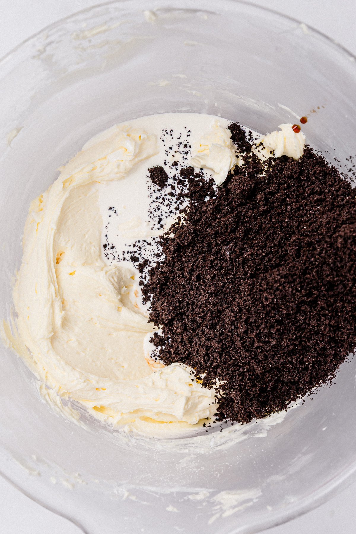 adding crushed Oreo cookies to buttercream frosting