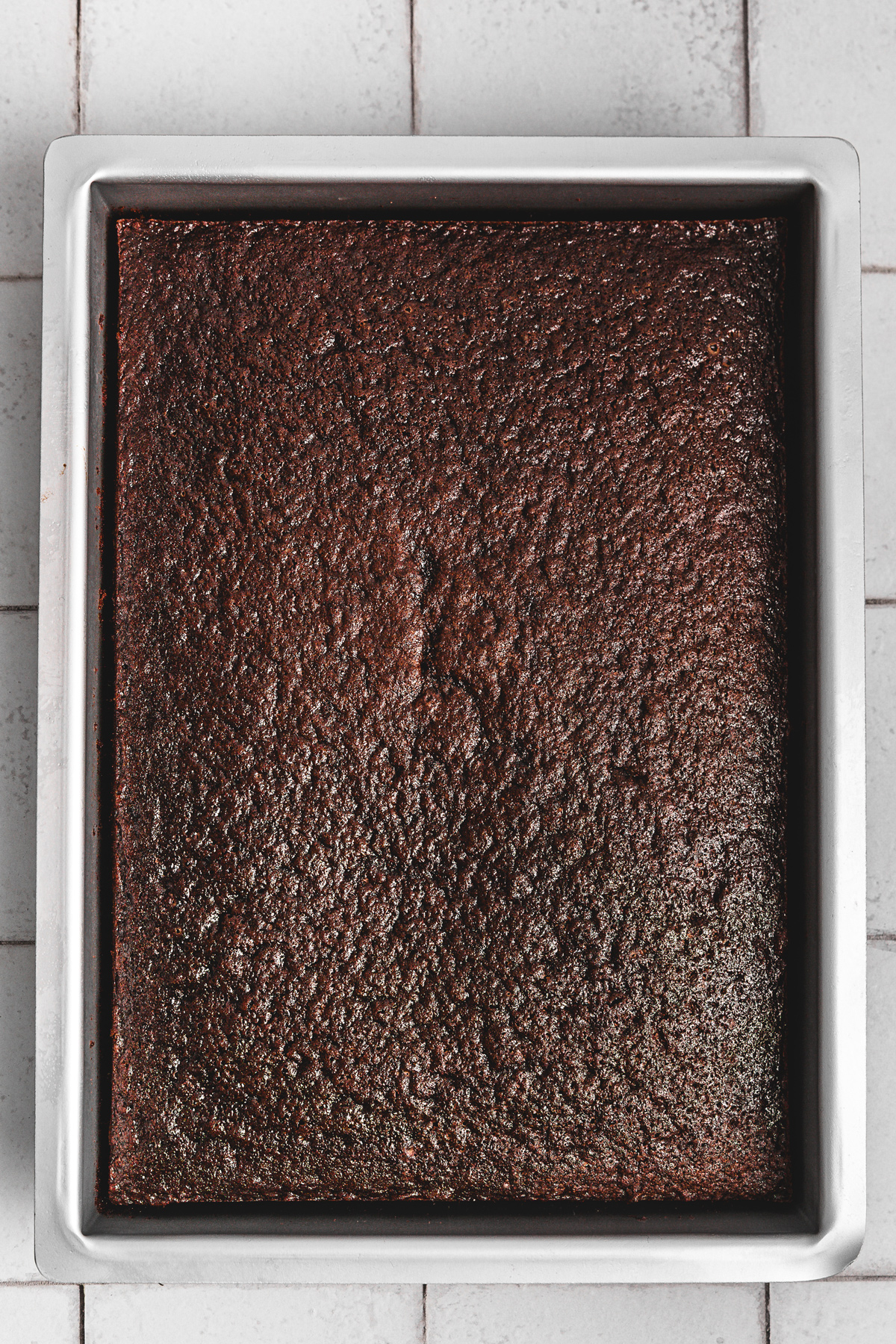 rectangular chocolate sheet cake baked in pan