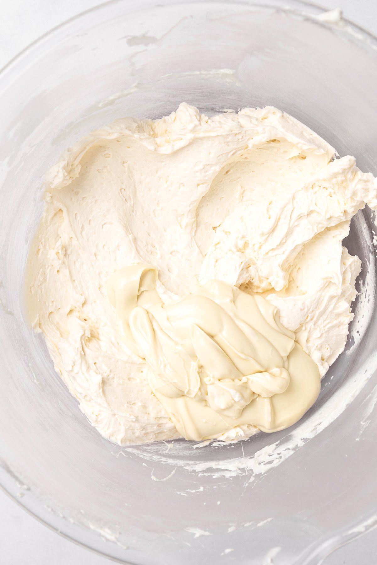 white chocolate buttercream frosting with melted white chocolate added