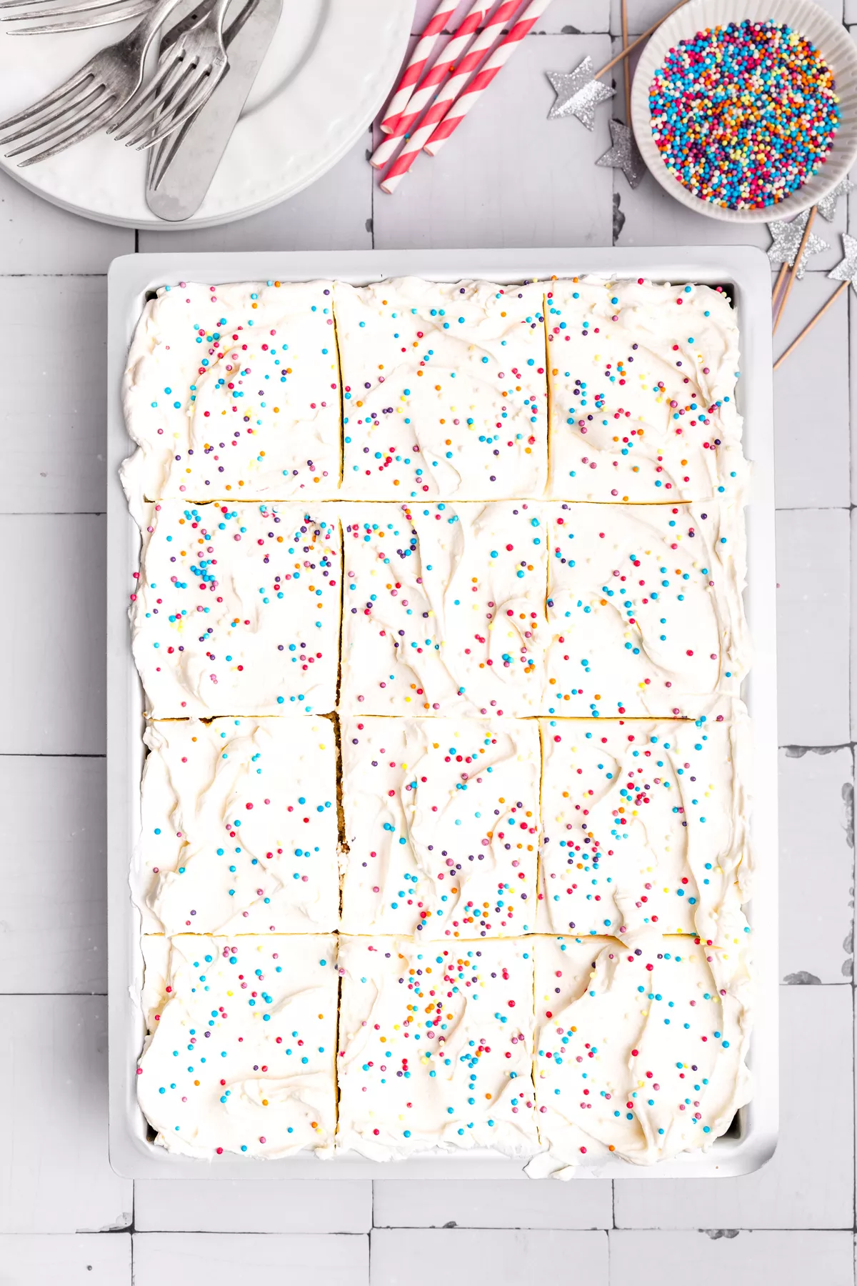 vanilla sheet cake baked in rectangular pan on table