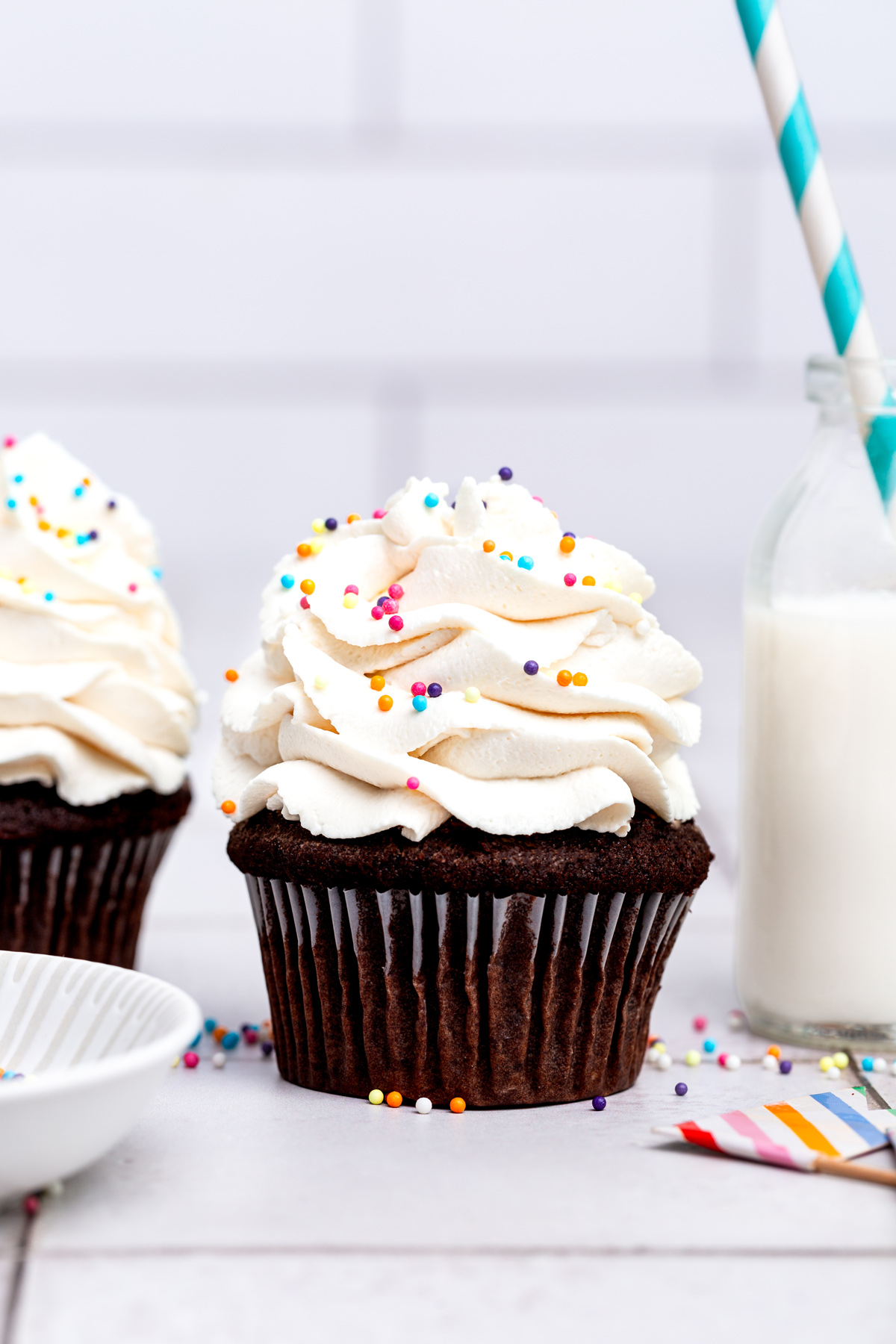 chocolate cupcakes with vanilla frosting close up