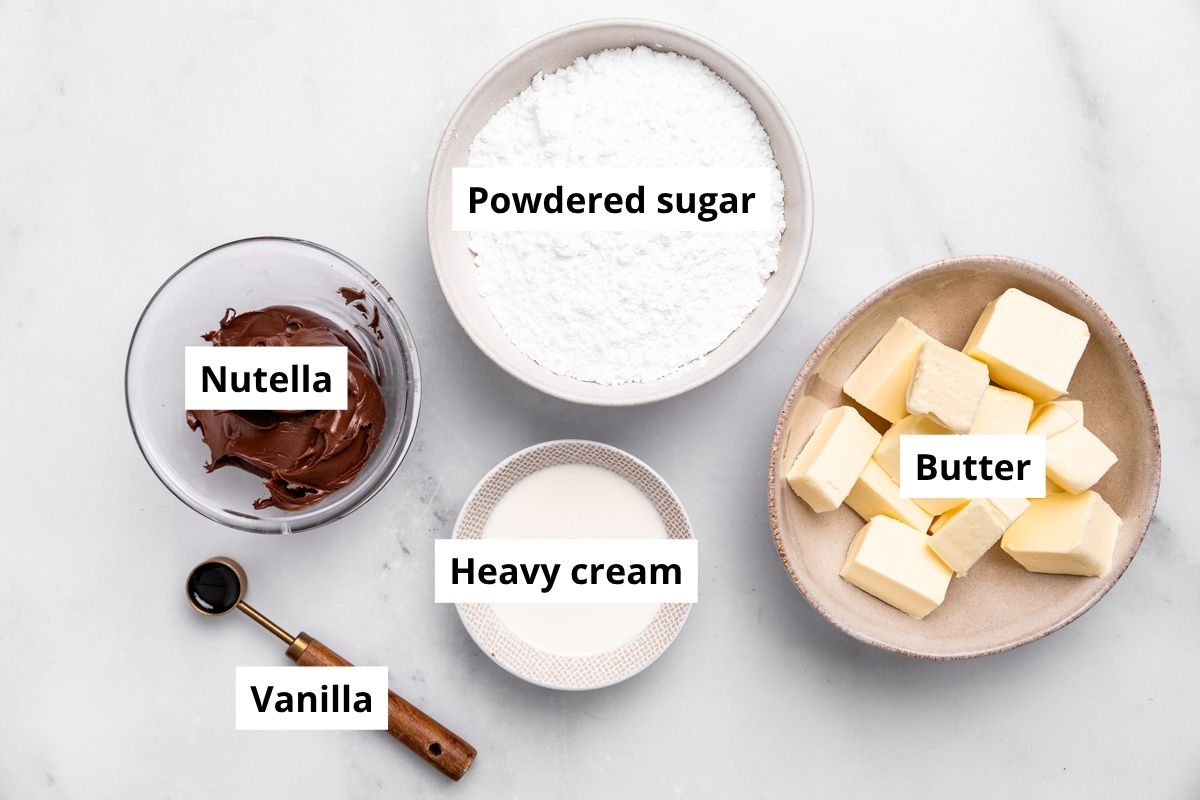 ingredients for nutella buttercream frosting in bowls