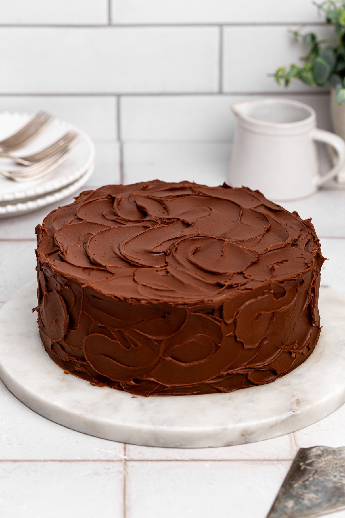 homemade matilda cake layered with chocolate fudge frosting