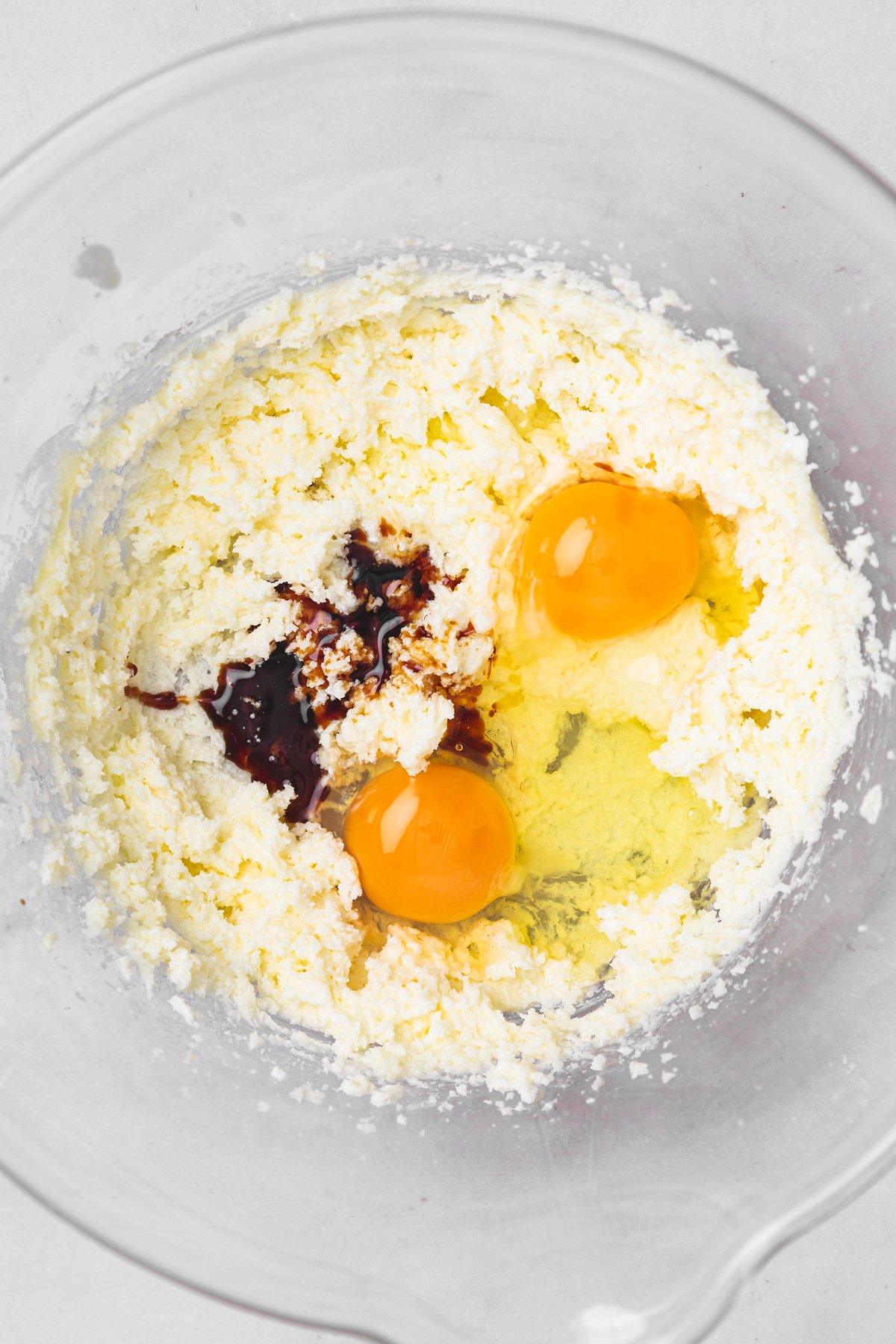 butter sugar eggs and vanilla mixed for strawberry cupcake batter
