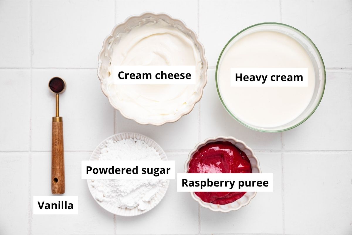 Ingredients for raspberry cream cheese frosting in bowls