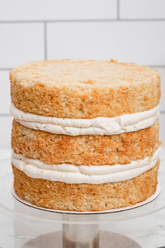 Assembled raspberry mascarpone cake before frosting