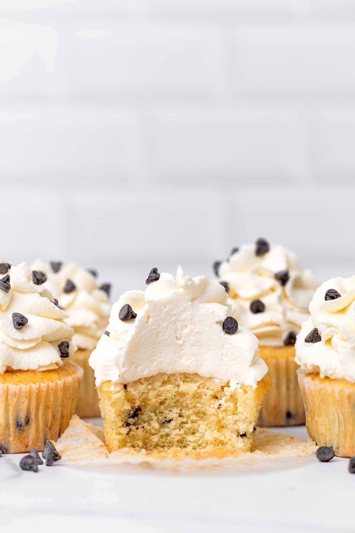 Chocolate chip cupcake cut open showing the soft center