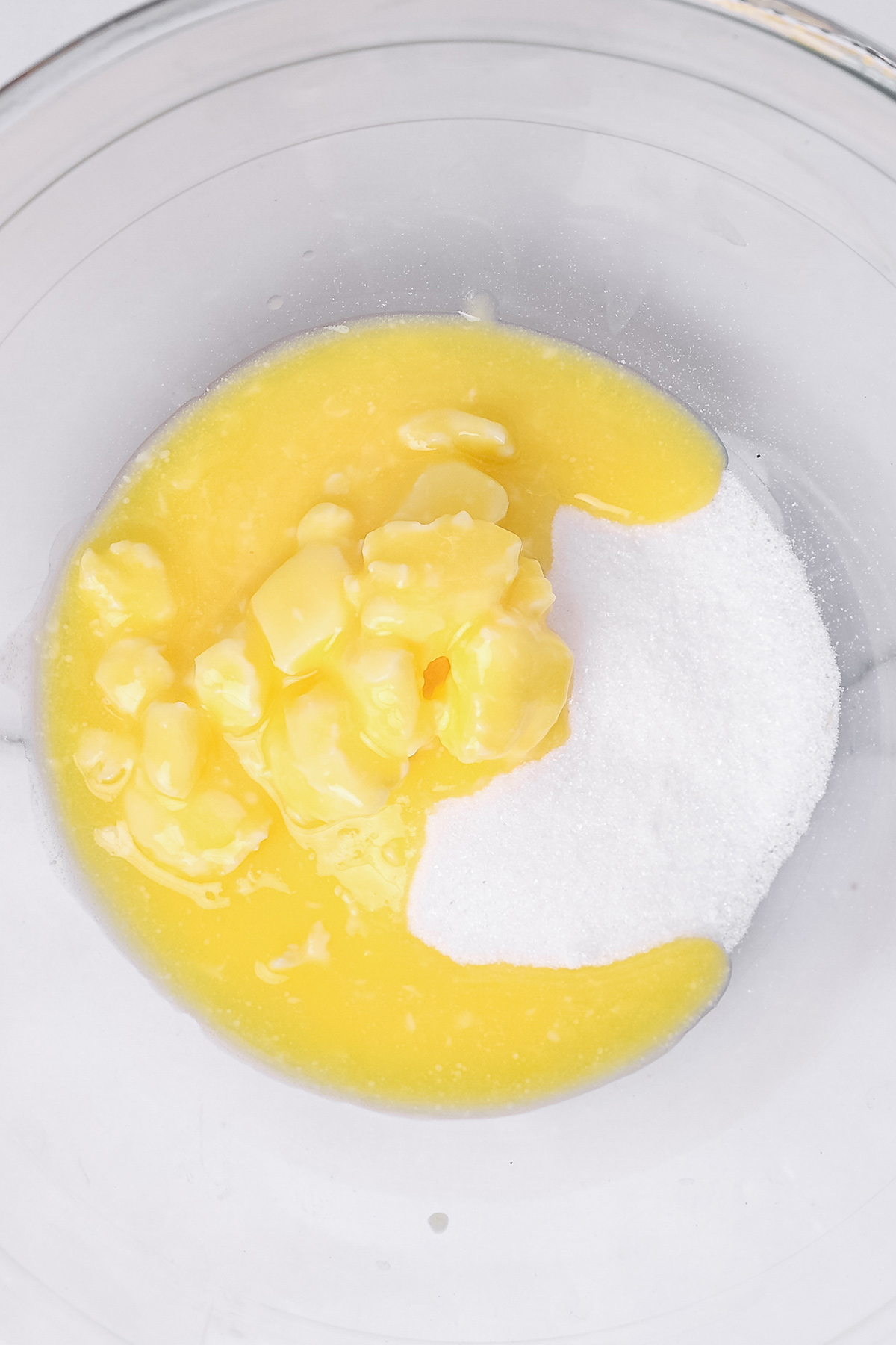Butter and sugar in a mixing bowl