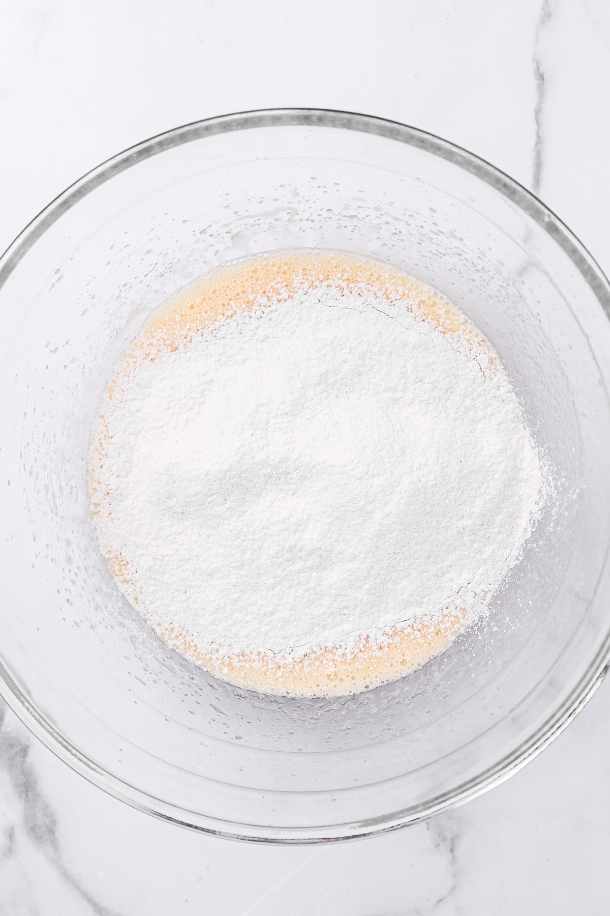 Mixing dry ingredients into the Oreo muffin batter