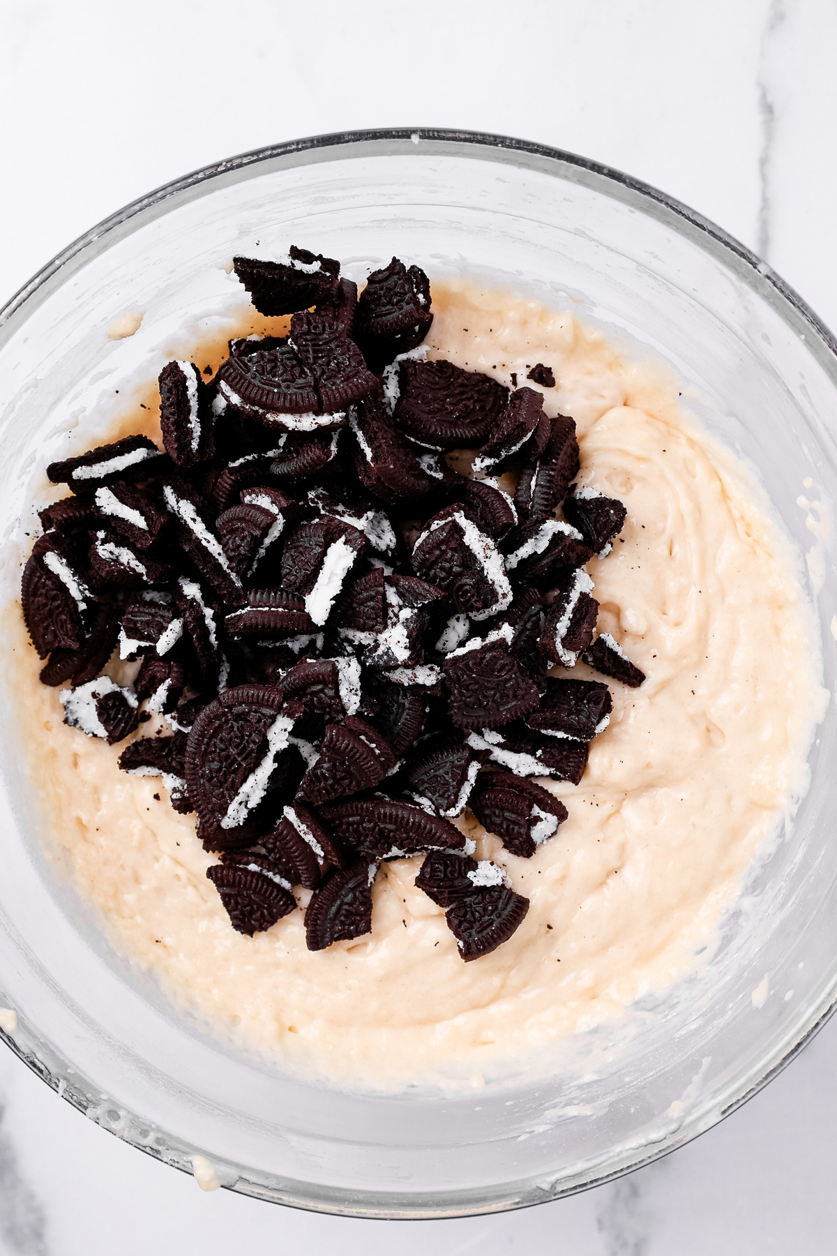 Oreo muffin batter with chopped Oreo cookies