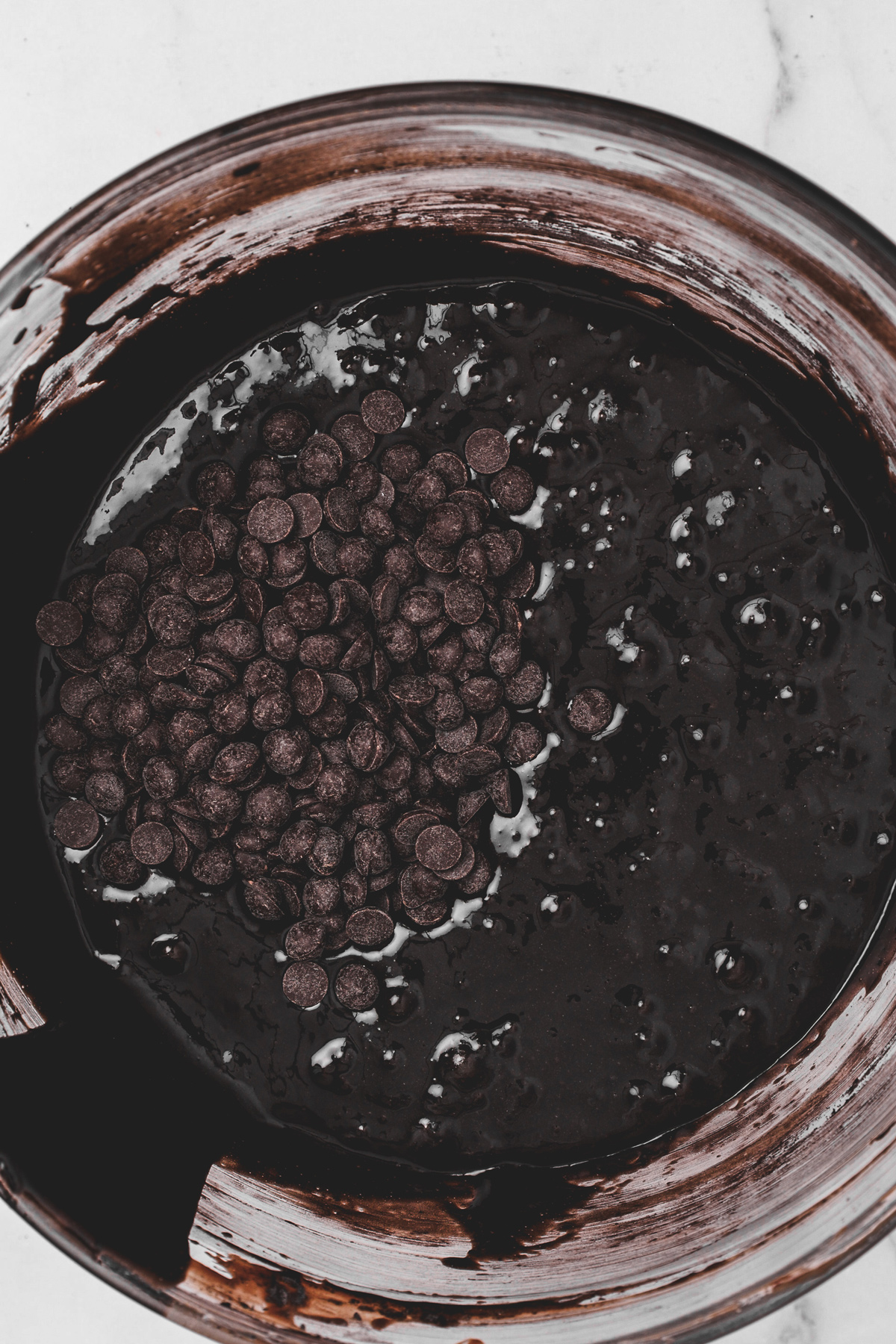Black cocoa brownie batter with chocolate chips