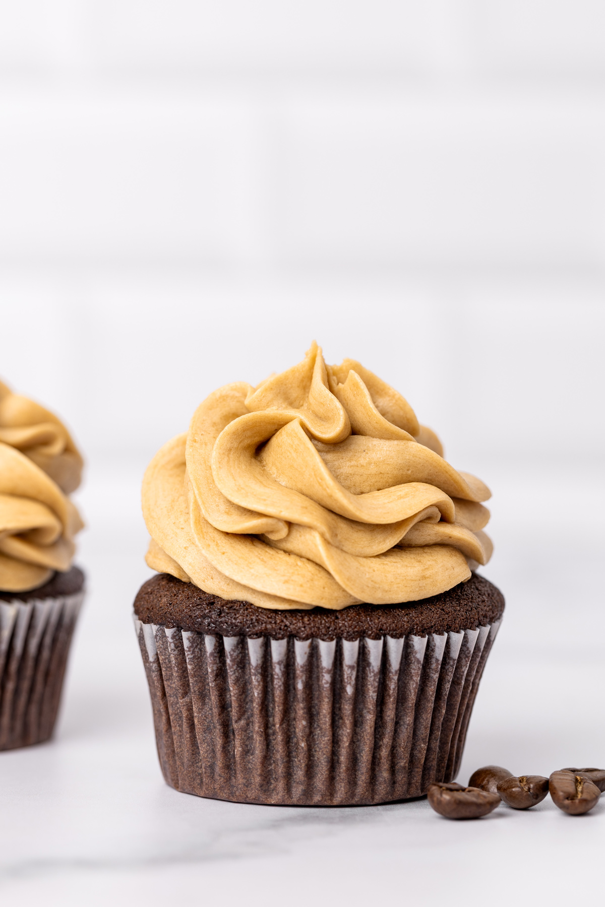 Chocolate cupcake topped with coffee buttercream frosting